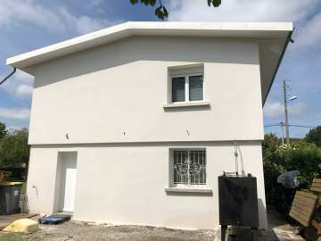 Pose de mur pierre sur mur en crépis à Tarbes
