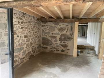 Rénovation d'un mur en pierre à Lourdes