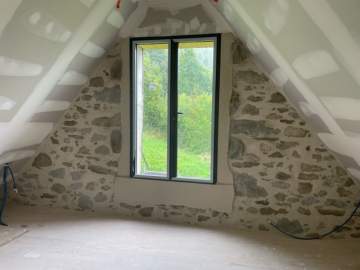 Rénovation d'un mur en pierre à Lourdes