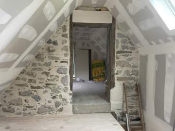 Rénovation d'un mur en pierre à Lourdes
